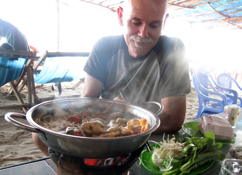 Doc, enjoying a hot pot on Bai Dai Beach.